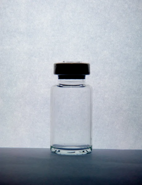 Silhouette du flacon injectable montrer le concept de laboratoire — Photo