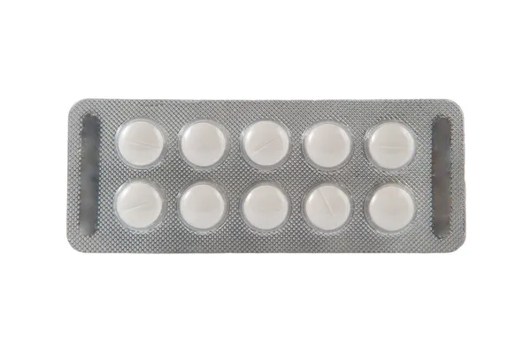 Plain white tablet in transparent blister pack — Stock Photo, Image