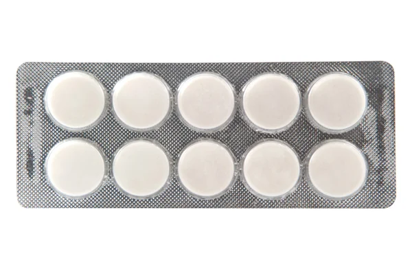Plain white tablet in transparent blister pack — Stock Photo, Image
