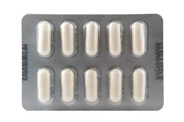 Witte harde capsule in transparante blister pack — Stockfoto