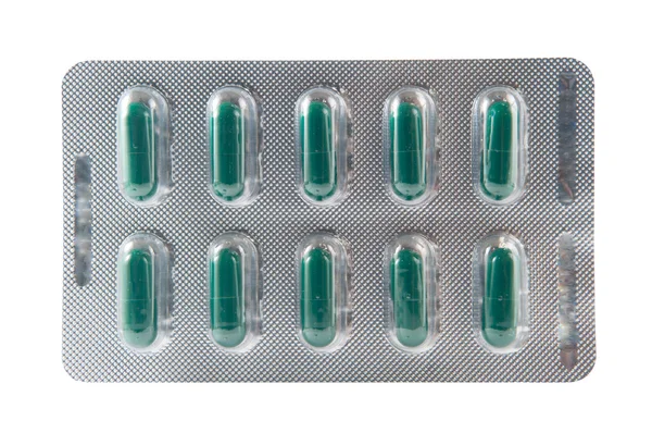 Groene harde capsule in blisterverpakking — Stockfoto