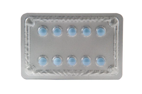Różowe tabletki w przezroczyste opakowanie blister — Zdjęcie stockowe