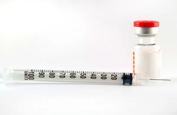 Disposable syringe and injection vials — Stock Photo, Image