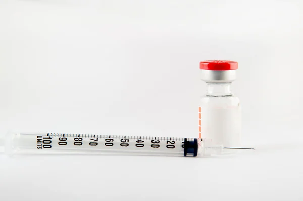 Disposable syringe and injection vials — Stock Photo, Image