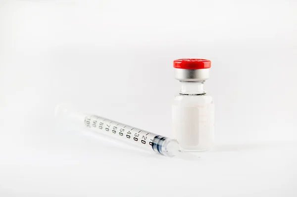 Injection vial and disposable syringe — Stock Photo, Image