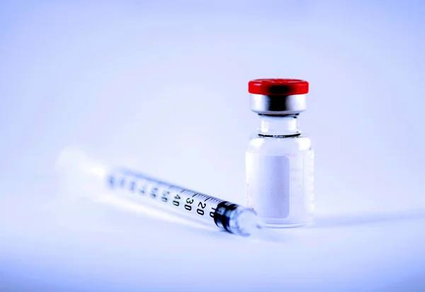 Disposable syringe and injection vial — Stock Photo, Image