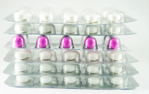 Stack capsule and tablet in blister pack — Stock Photo, Image