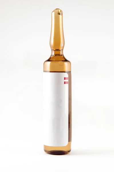 Ampolla marrón sobre fondo blanco —  Fotos de Stock