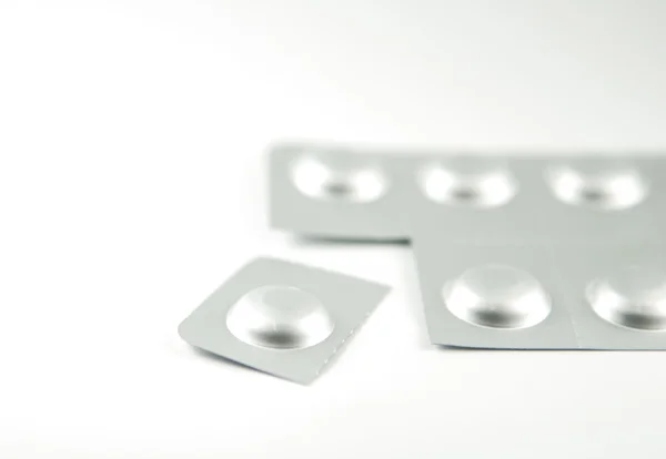 One tablet pick from Aluminum blister packing show dosage give t — Stock Photo, Image