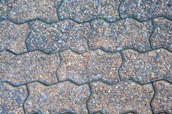 Geschlossene Ziegelstruktur auf dem Straßenboden — Stockfoto