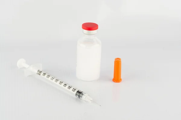 Disposable syringe and insulin vial — Stock Photo, Image