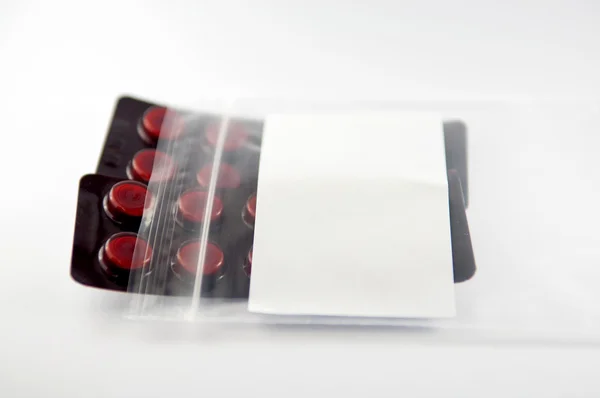 Medicine tablet blister pack in dispensing plastic bag — Stock Photo, Image