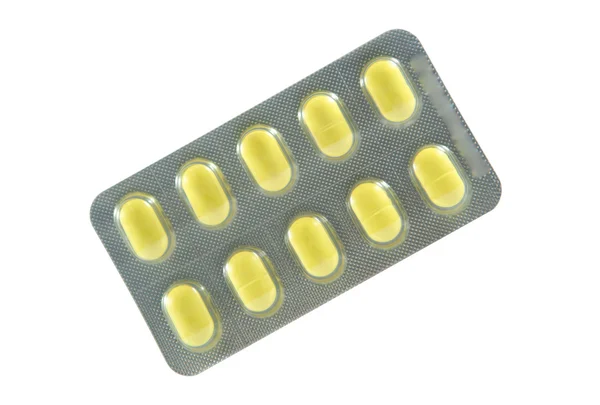 Gelbe Tablette in Blisterverpackung — Stockfoto