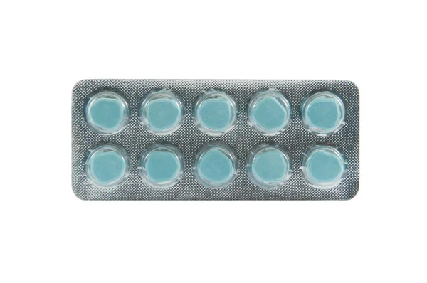 Blue tablet in transparent blister pack — Stock Photo, Image