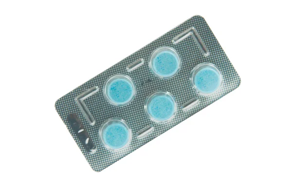Niebieska tabletka w przezroczyste opakowanie blister — Zdjęcie stockowe