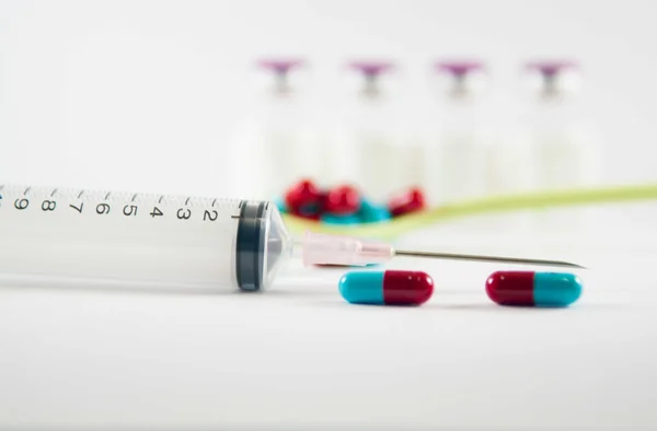 Disposable Syringe and medicine background — Stock Photo, Image