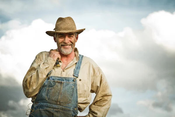 Фермер улыбается — стоковое фото