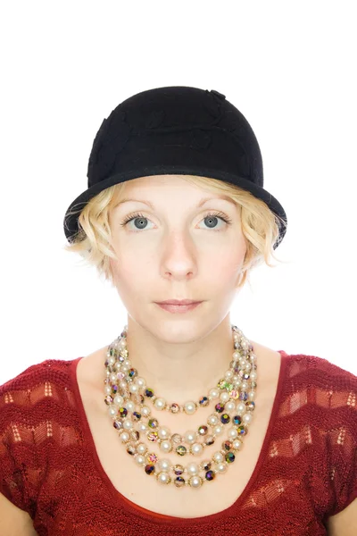 Portrait of a beautiful girl in a black hat — Stock Photo, Image