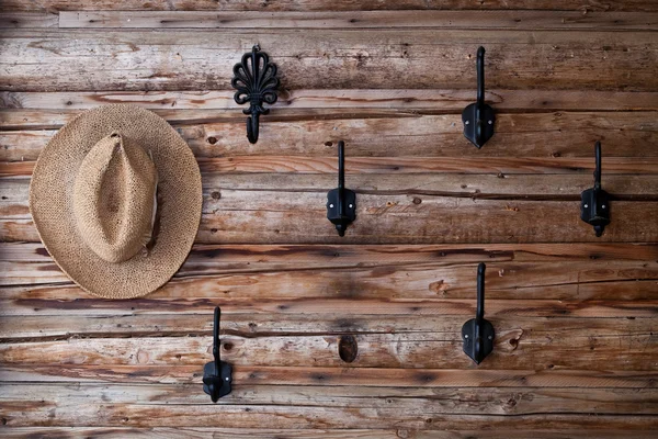 Hats hanging on hook — Stock Photo, Image