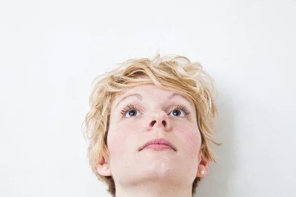 Blonde girl looking up — Stock Photo, Image