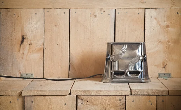 Old classic toaster on a nice cedar plank of wood texture. — Stock Photo, Image