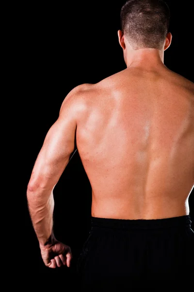 肌肉健美运动员的背后 — 图库照片