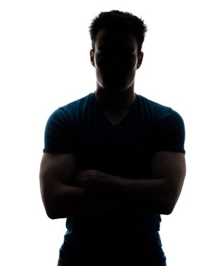 Male figure in silhouette looking at the camera clipart
