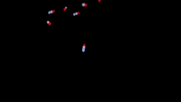 Cápsulas de pastillas cayendo — Vídeo de stock