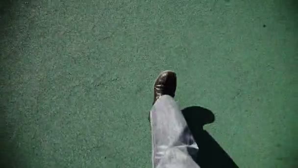 Man Walking on green texture — Stock Video