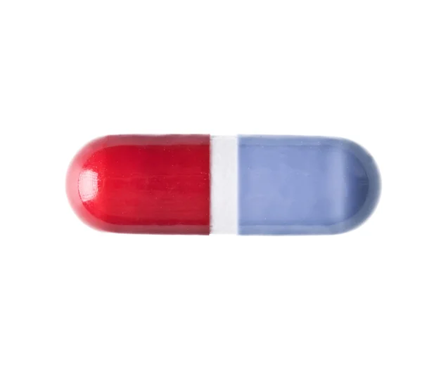 Nahaufnahme einer roten und einer blauen Tablette — Stockfoto