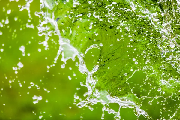 Falling Water Splash over Green Abstract Background with Room fo — Stock Photo, Image