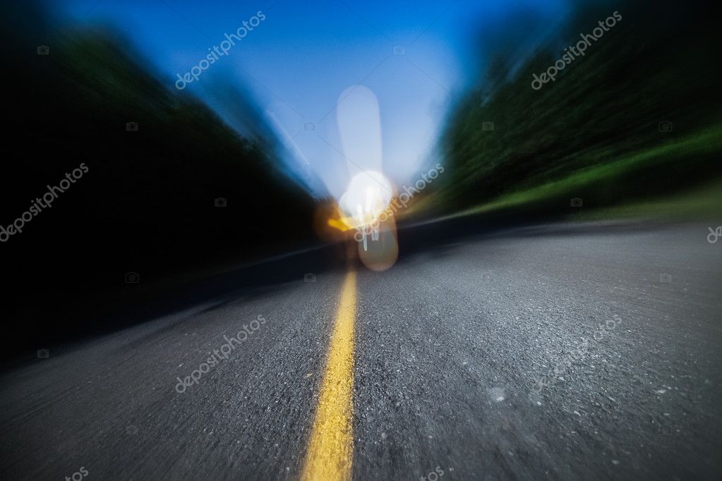 Blurry Road at Night. Drunk Driving, Speeding or Being too Tired Stock