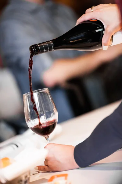 Pouring Red wine into Glass — Stock Photo, Image