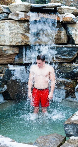 Man under Nordic Cold Water Spa Cascade — Stock Photo, Image