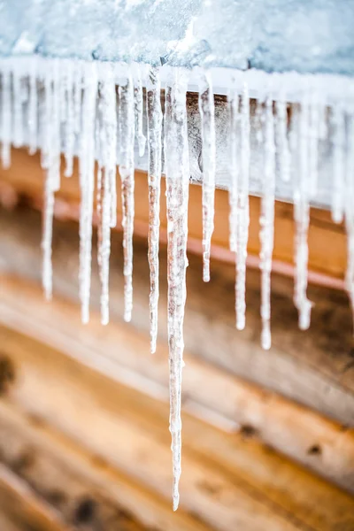 Long Icicles Melting of a roof top — Stock Photo, Image