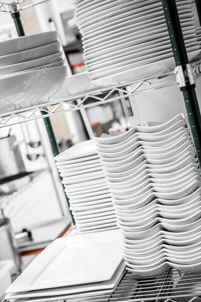 Stack of Cleaned Dishes in a Restaurant