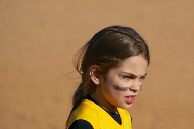 Softball Player Looking Across the Field clipart