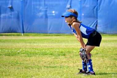 Softball Player Ready for the Next Play clipart