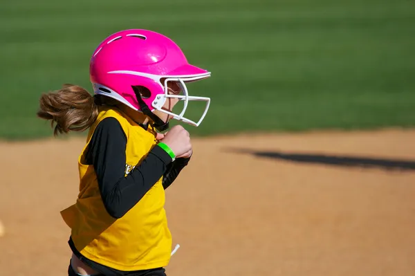 Softbal speler op zoek verbaasd over het spel Rechtenvrije Stockfoto's