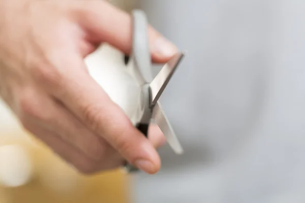 Man's hand with scissors . — Stock Photo, Image