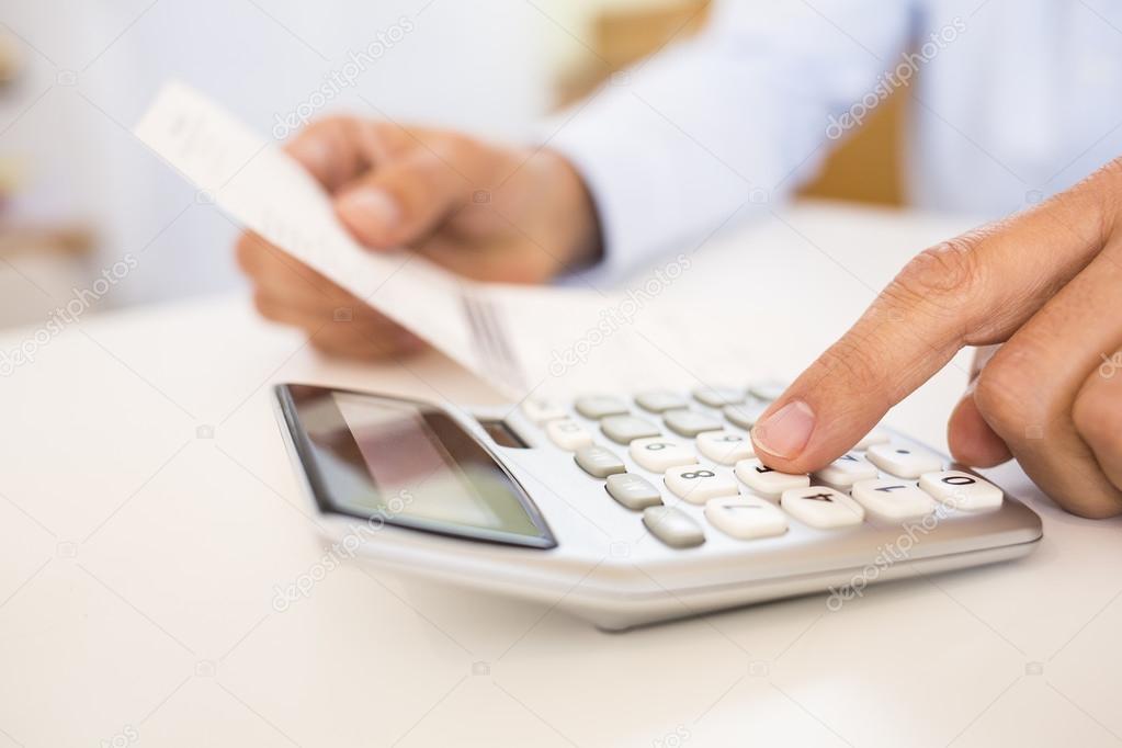 Man doing his accounting, financial adviser working