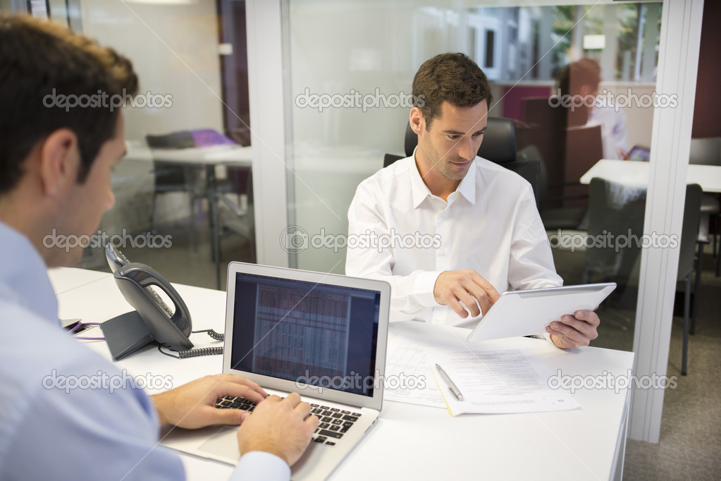 Businessmen working in office