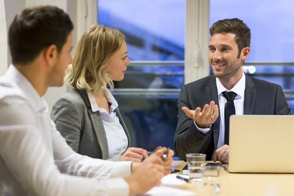 Three Business Peoples Working Together Meeting Room — стоковое фото