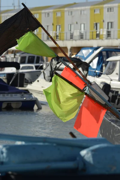 Flags on boats at Brighton marina. England — Stock Photo, Image