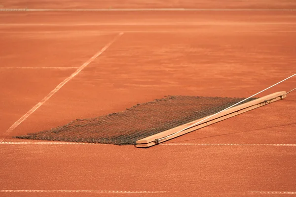 Herramienta por la que la pista de tenis está limpiando —  Fotos de Stock