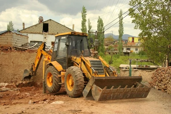 La máquina cargadora de excavadoras trabaja al aire libre —  Fotos de Stock