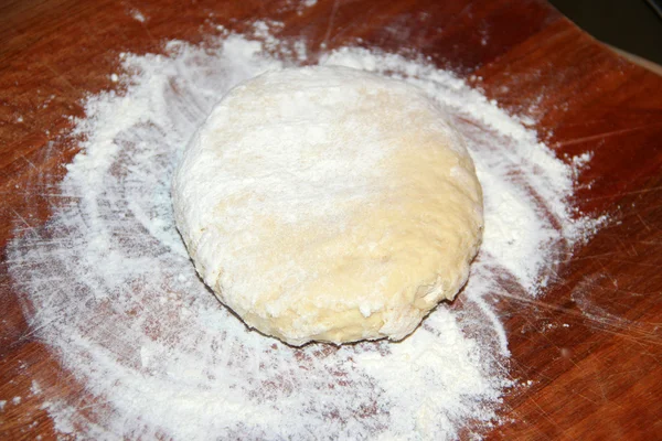 Ball of homemade dough with flour — Stock Photo, Image