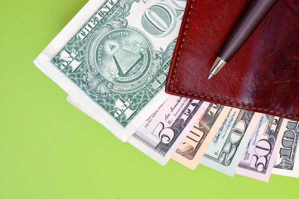 Banknotes, purse and pen — Stock Photo, Image