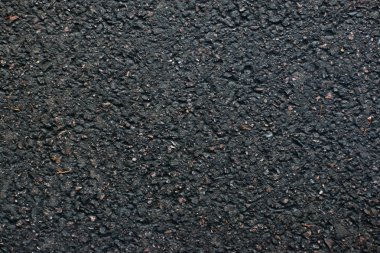 Fragment of an asphalt covering in park clipart