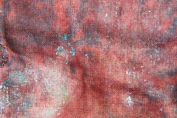 Fragment of red rough fabric — Stock Photo, Image